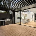 decking with BBQ and view of kitchen